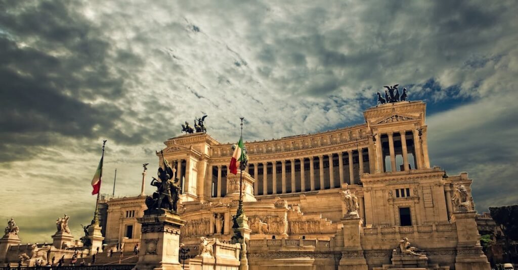 Rome Stunning view of the Victor Emmanuel II Monument in Rome under dramatic skies.